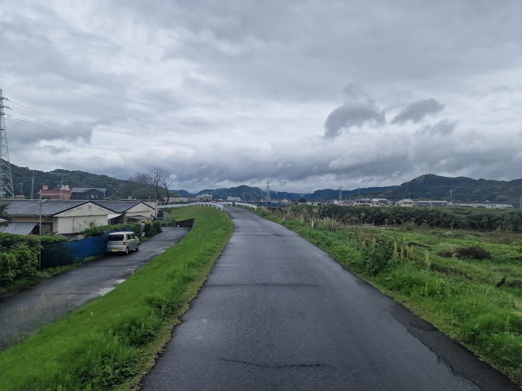 Wet asphalt and dark clouds