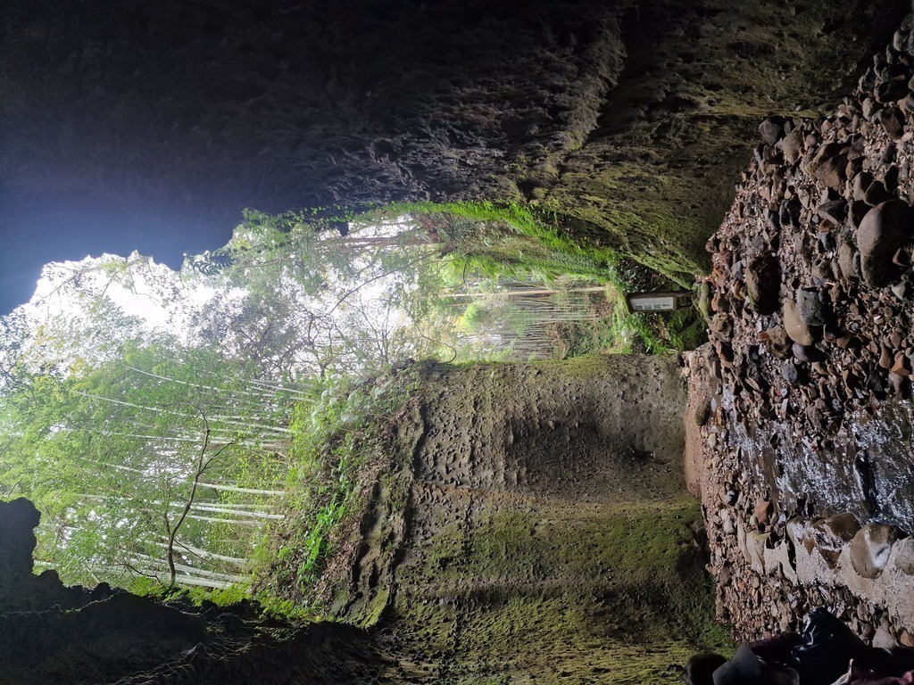 A hidden valley viewed from the cave opening