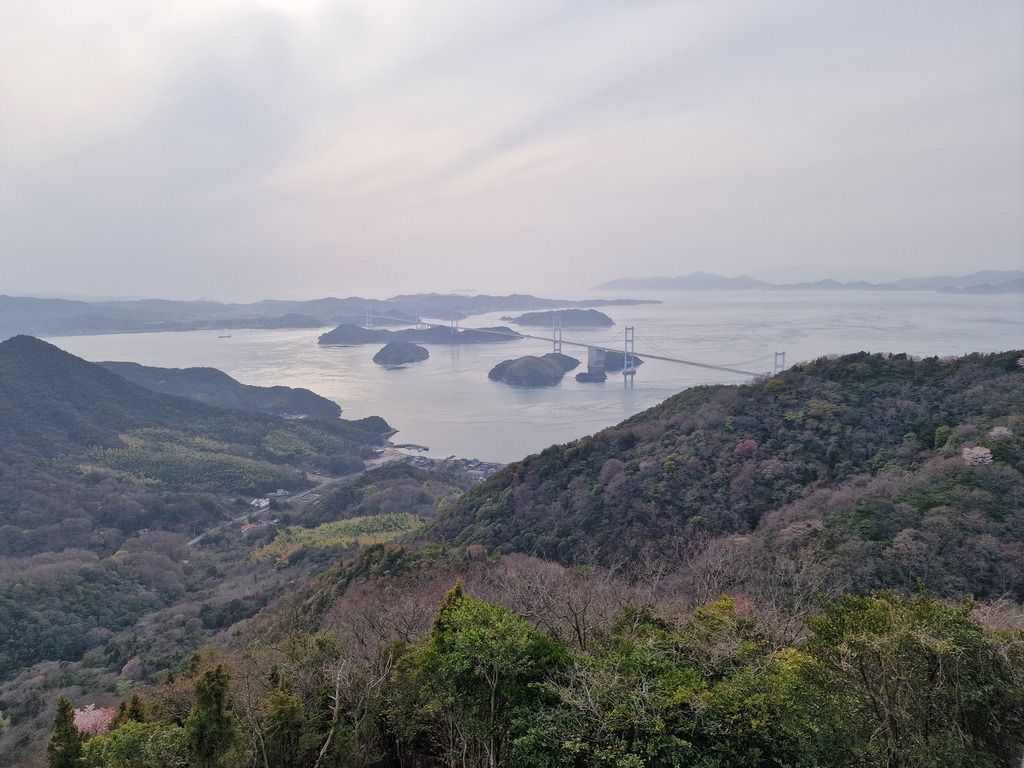 View of a long bridge crossing two small island in the channel between Shikoku and Ōshima.